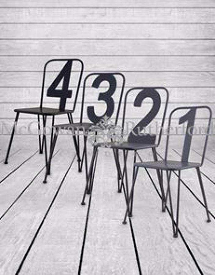 Set of 4 assorted grey numbers metal chairs