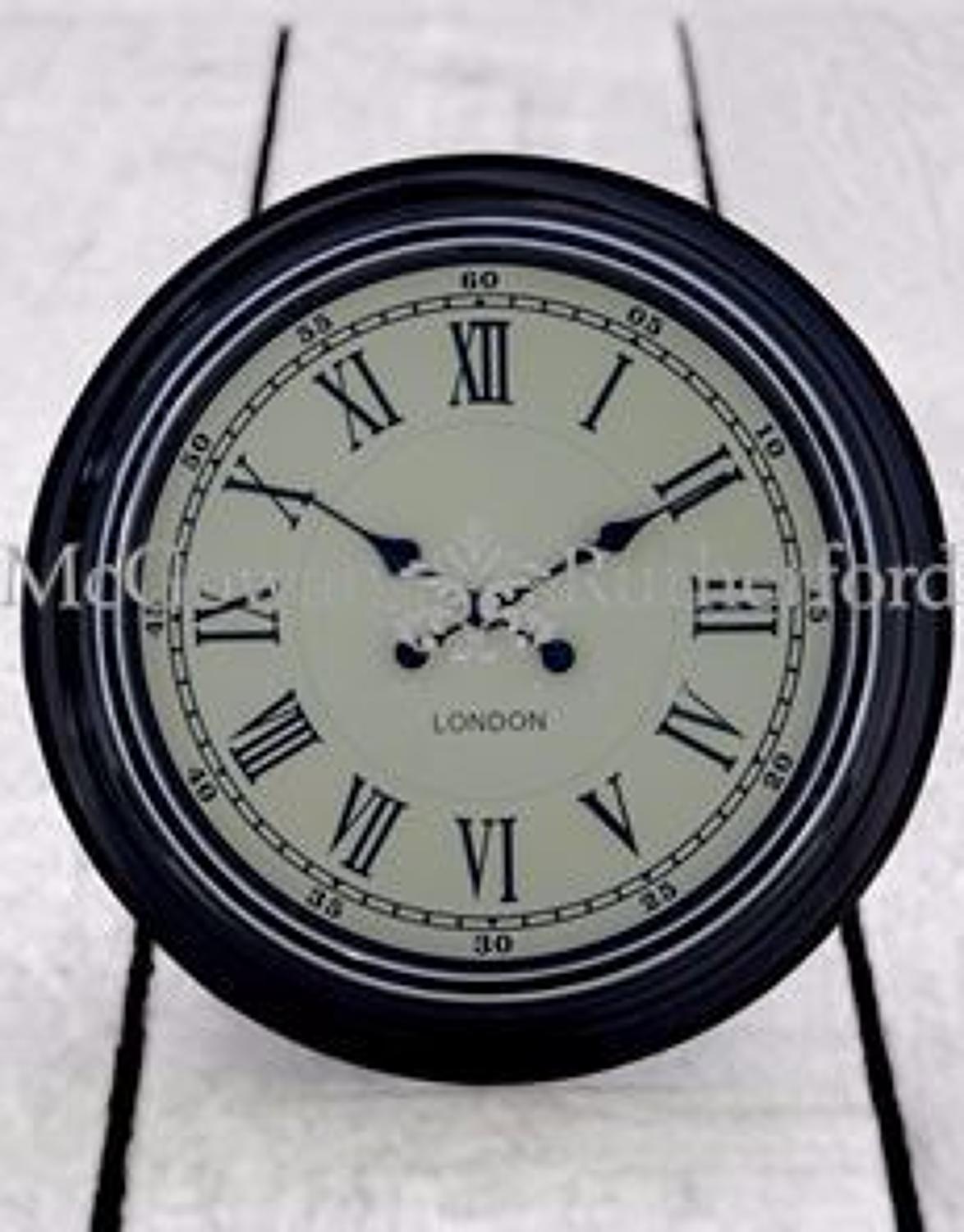 Modern black with white face wall clock